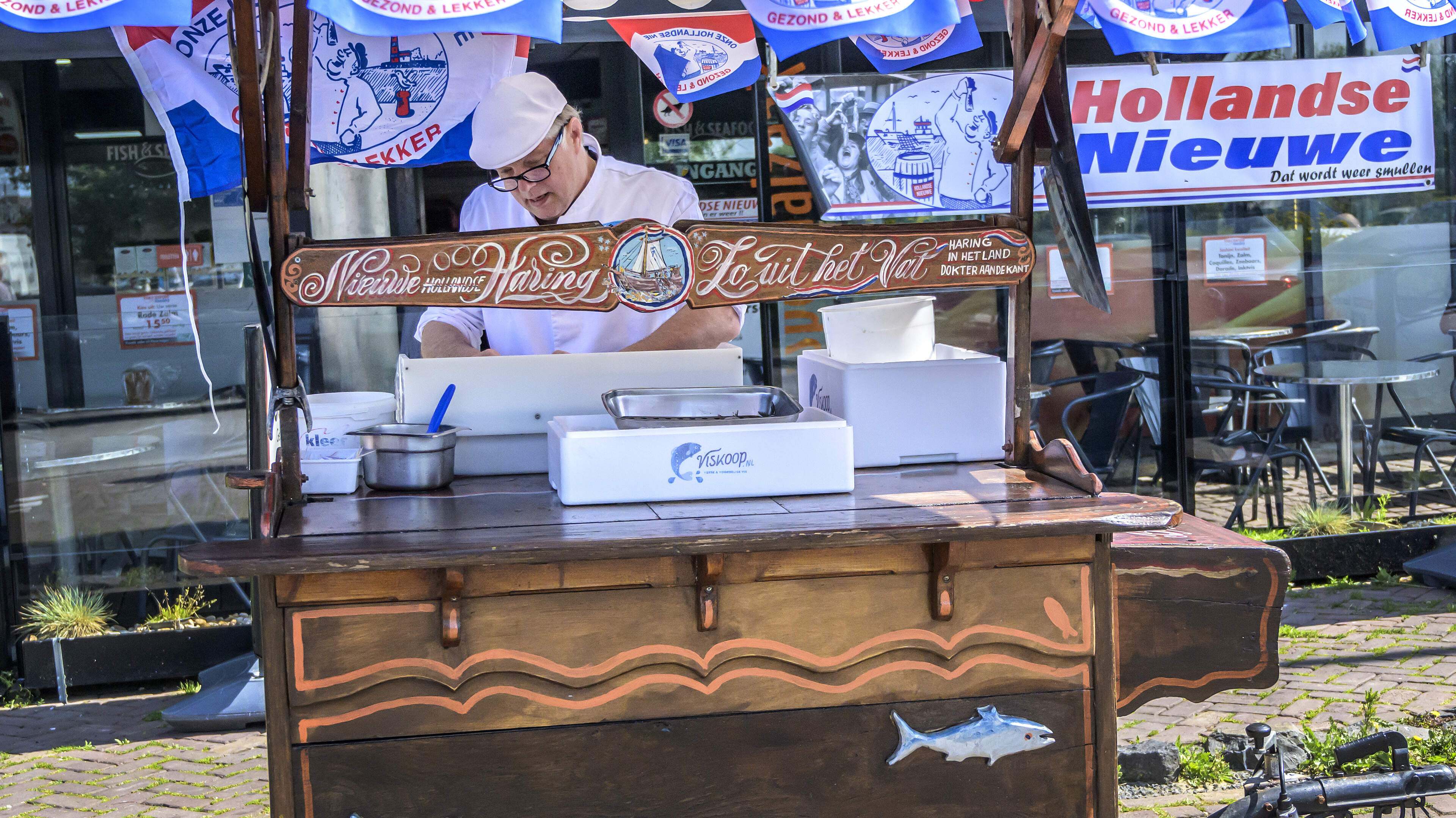 Fishmonger Nico Waasdorp sells Dutch new herring for one guilder in swipe at rivals charging four euros