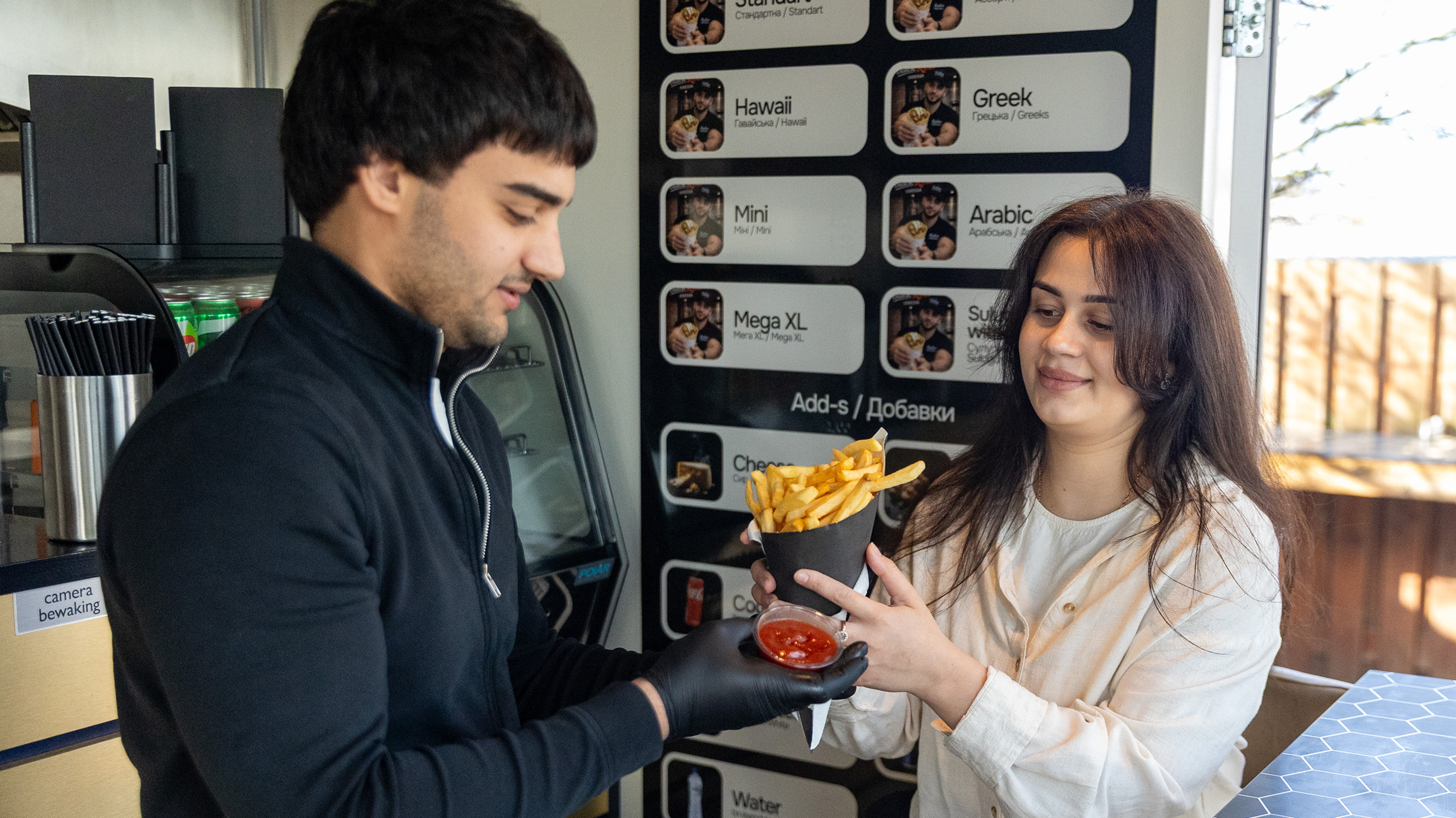 Ukrainian couple Olga and Ruslan open Black Roll Odessa kiosk at Velserpont: 'The best shawarma is in Odessa, we’re bringing it here'